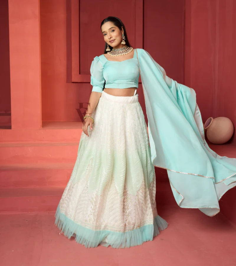 This off-white and turquoise lehenga