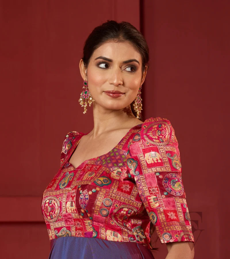 A pinkish violet flared umbrella gown