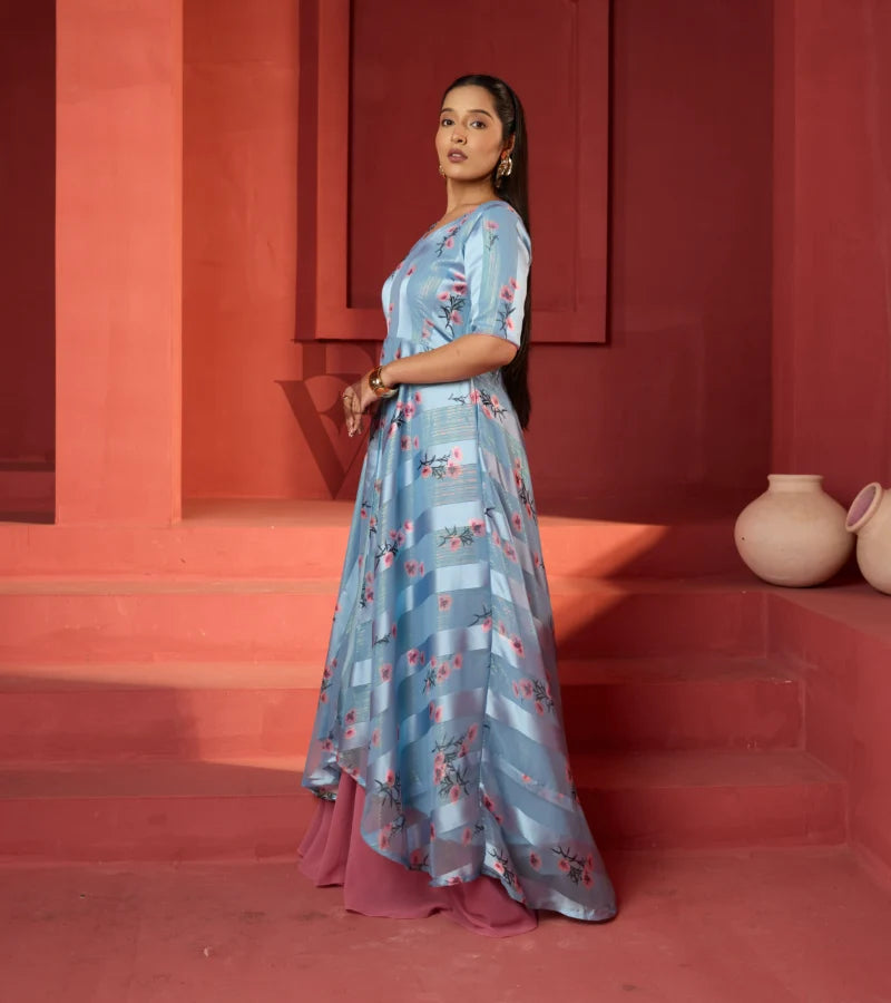 A powder blue printed long coat-style top paired with a flowy mild pink palazzo