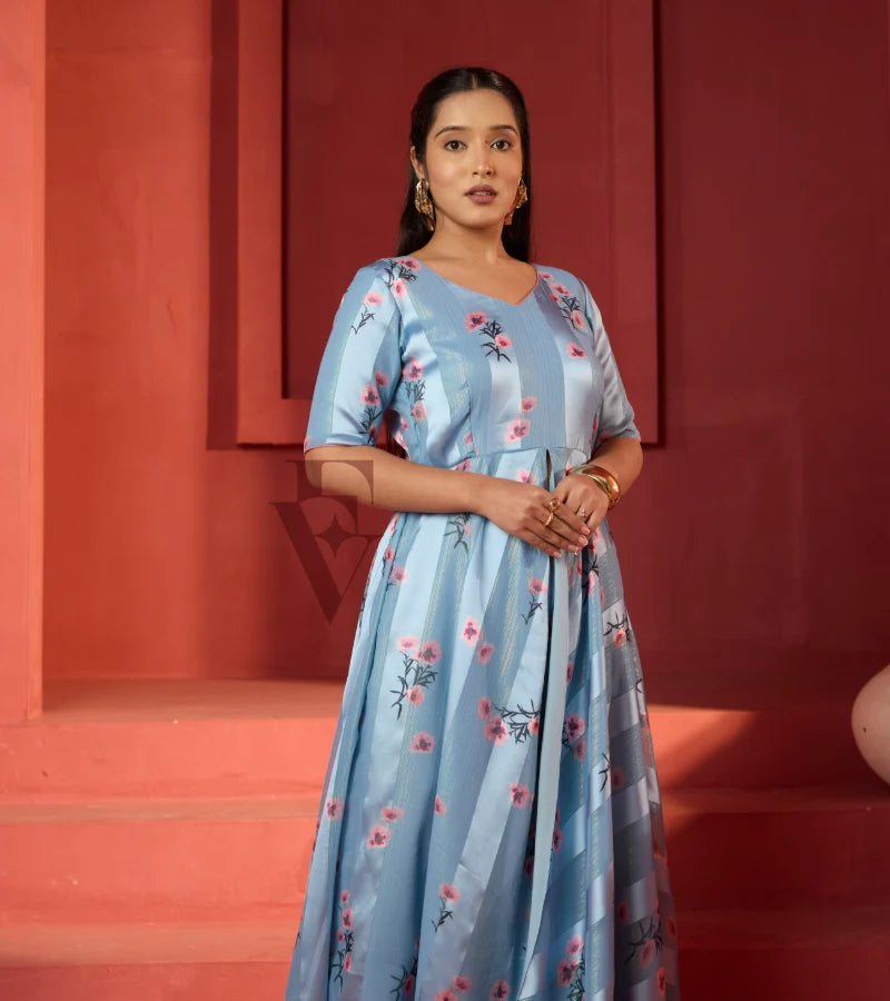 A powder blue printed long coat-style top paired with a flowy mild pink palazzo