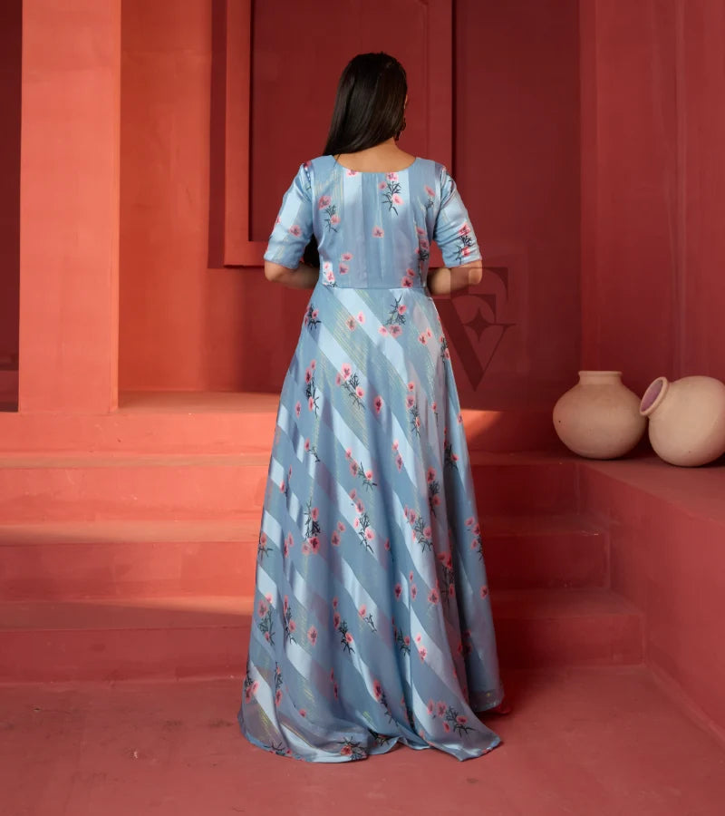 A powder blue printed long coat-style top paired with a flowy mild pink palazzo