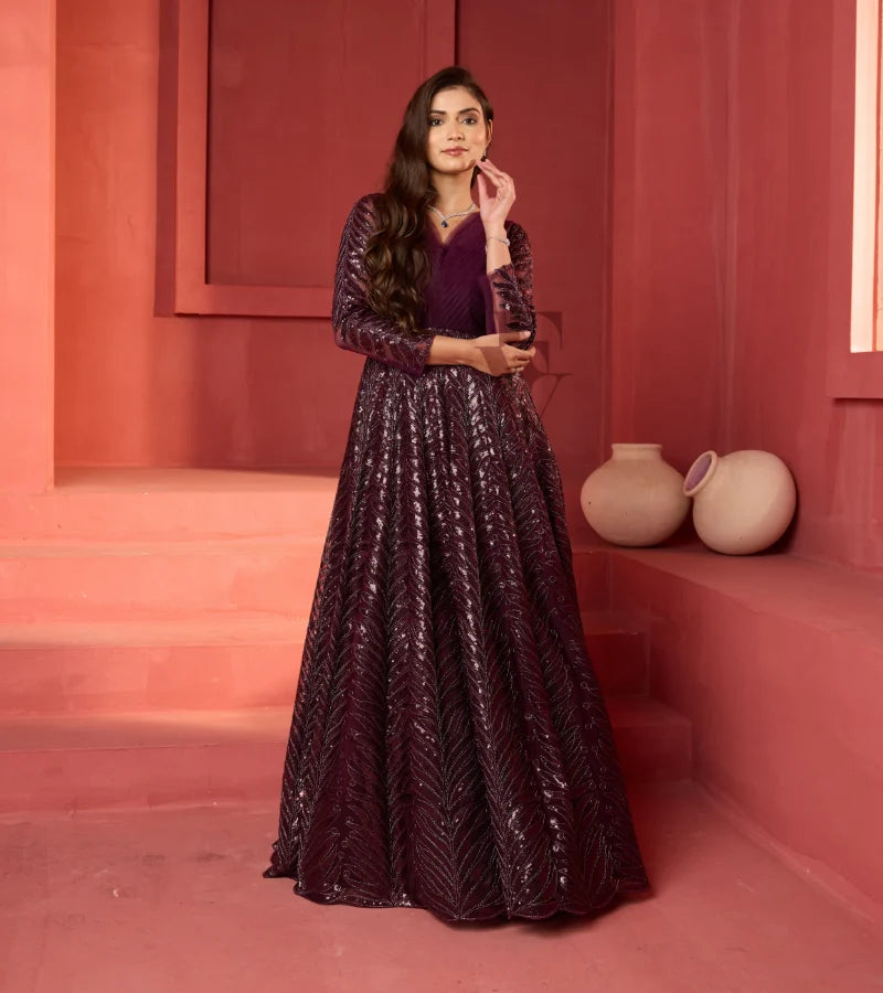 A wine-coloured premium net gown
