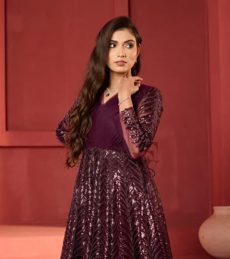 A wine-coloured premium net gown