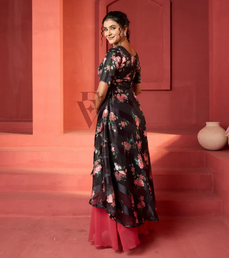 A flowy deep onion pink georgette plaza paired with a black printed georgette satin long coat