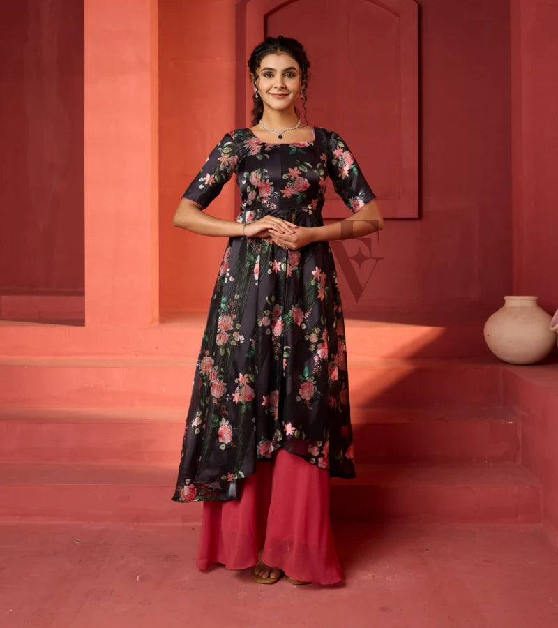 A flowy deep onion pink georgette plaza paired with a black printed georgette satin long coat