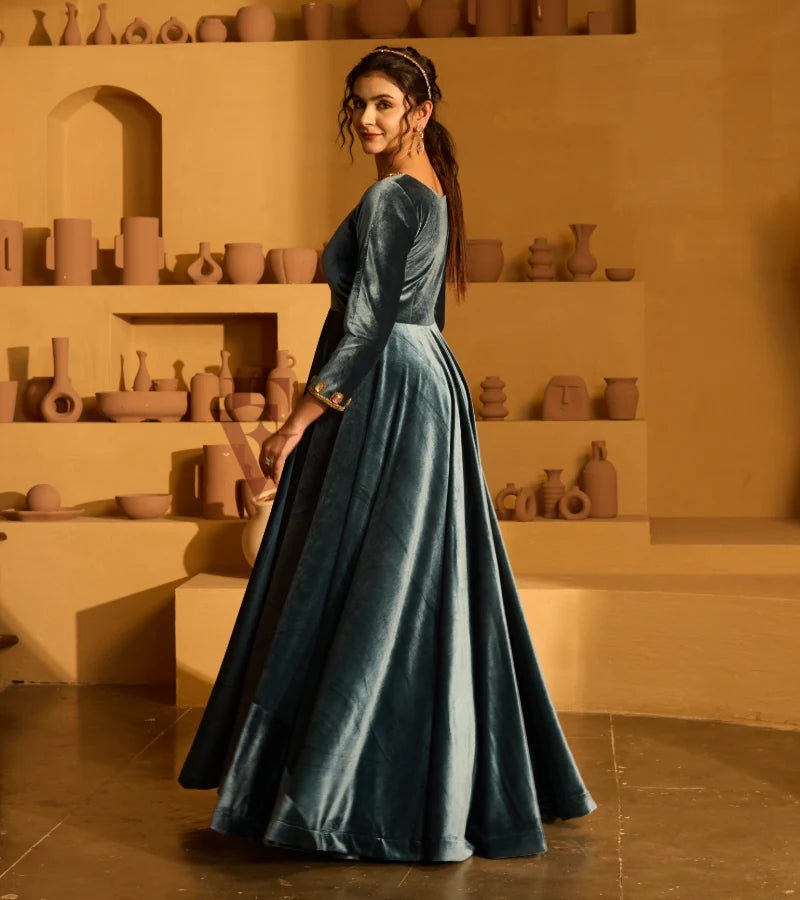 Designed in a deep peacock blue