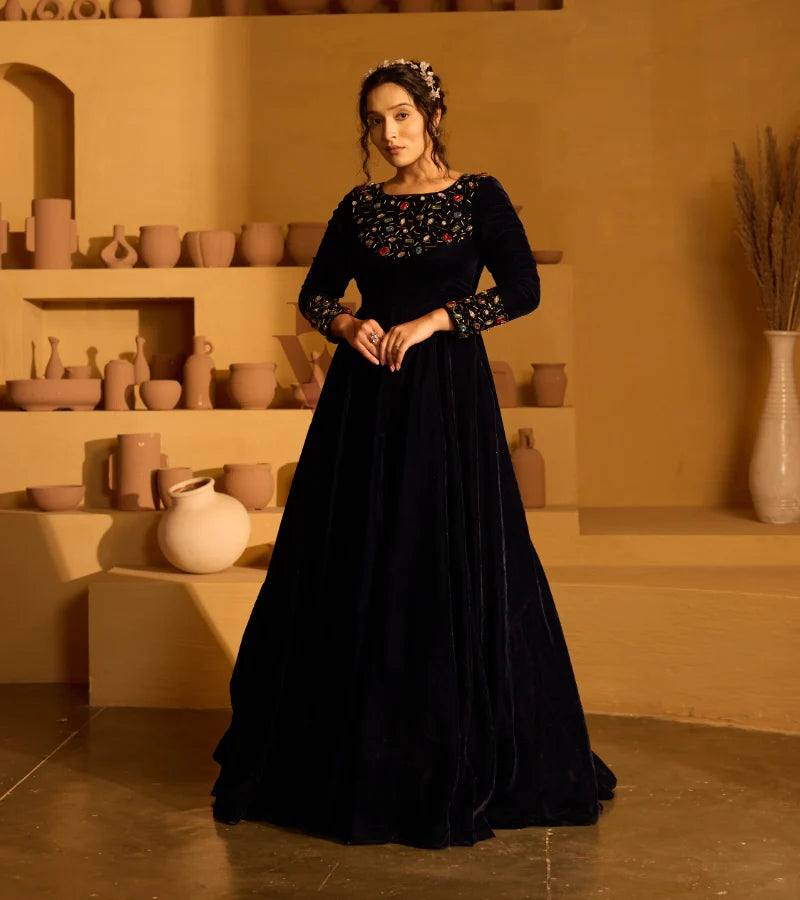 A navy blue velvet gown