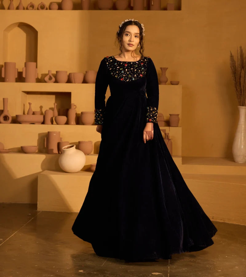 A navy blue velvet gown