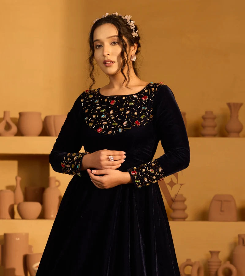 A navy blue velvet gown