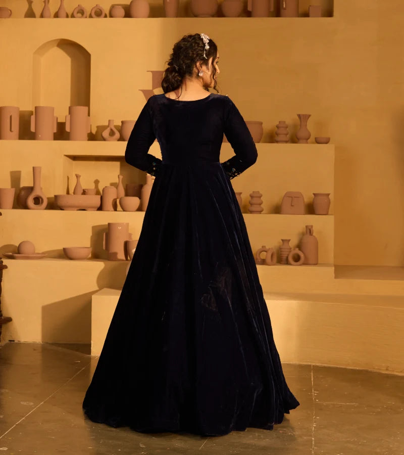 A navy blue velvet gown