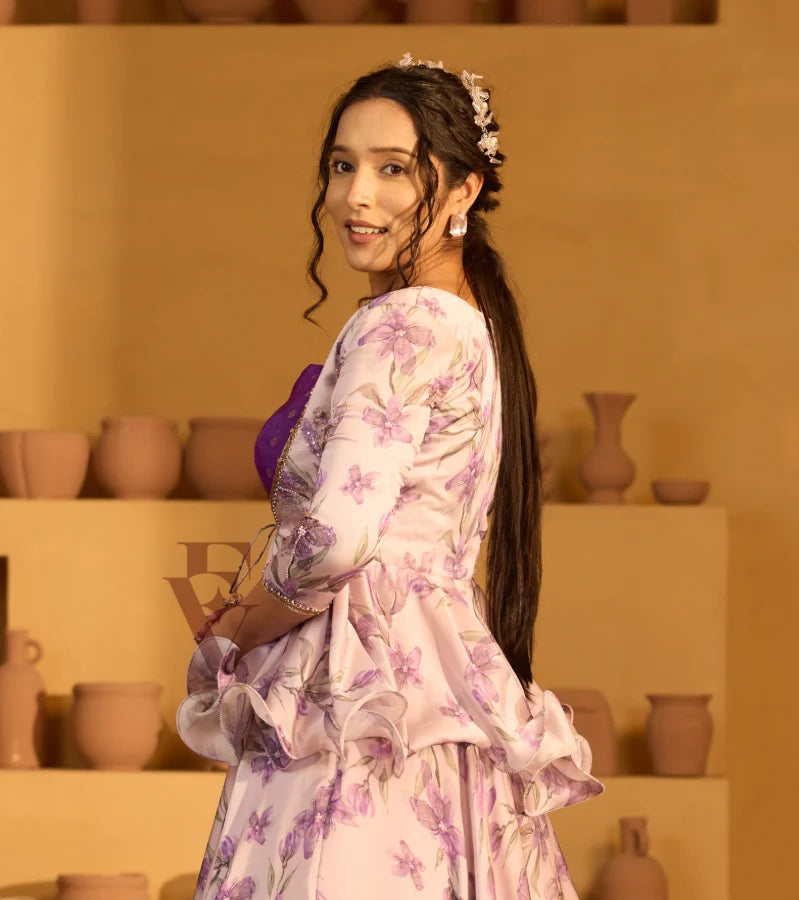 A lavender georgette satin skirt paired with a violet Banarasi silk blouse