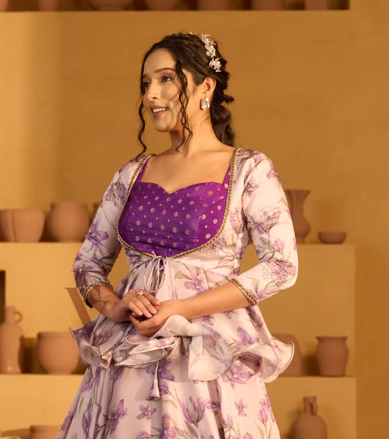 A lavender georgette satin skirt paired with a violet Banarasi silk blouse