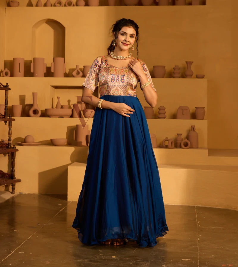 A peacock blue georgette silk gown