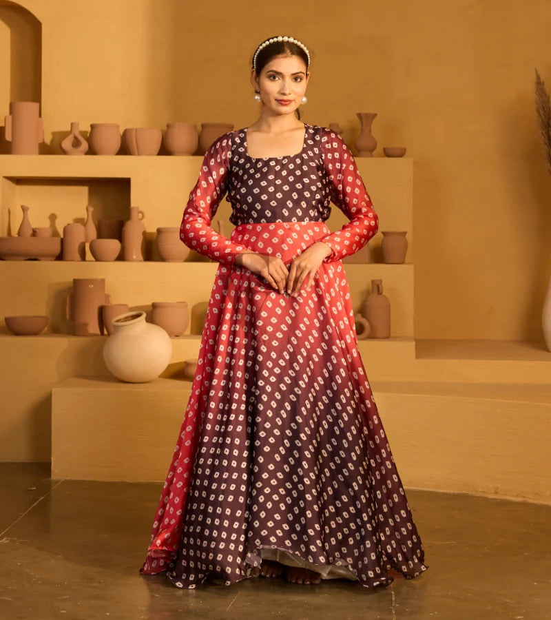 A red and dark brown satin georgette gown