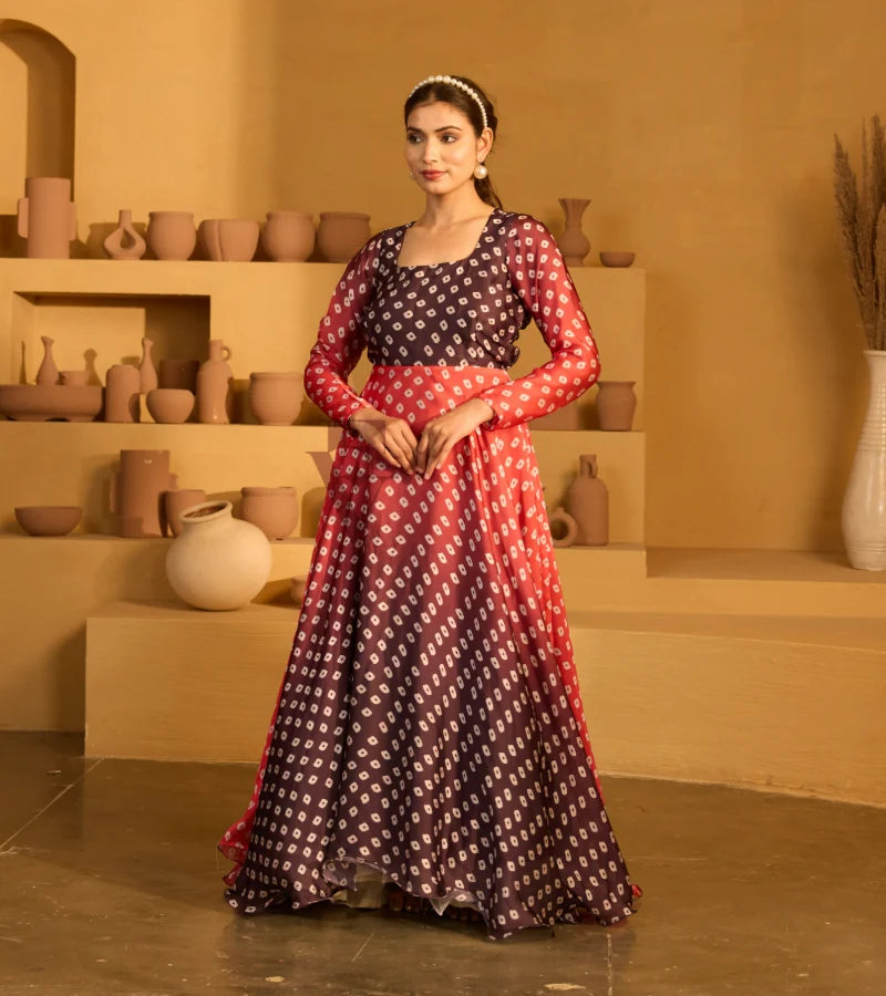 A red and dark brown satin georgette gown