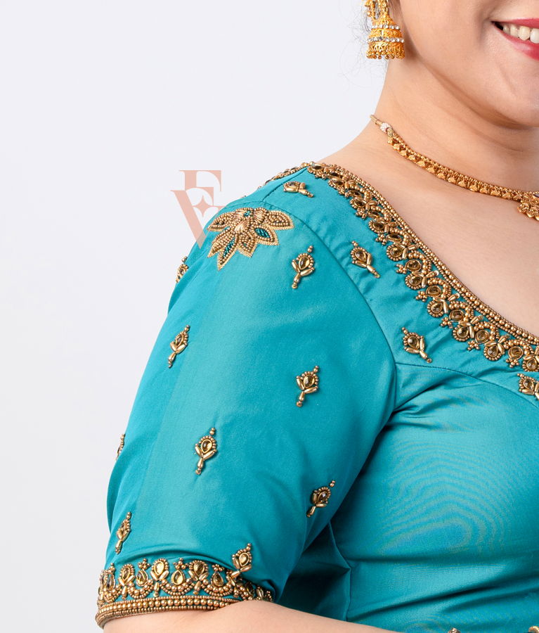 A Rama blue silk cotton blouse designed