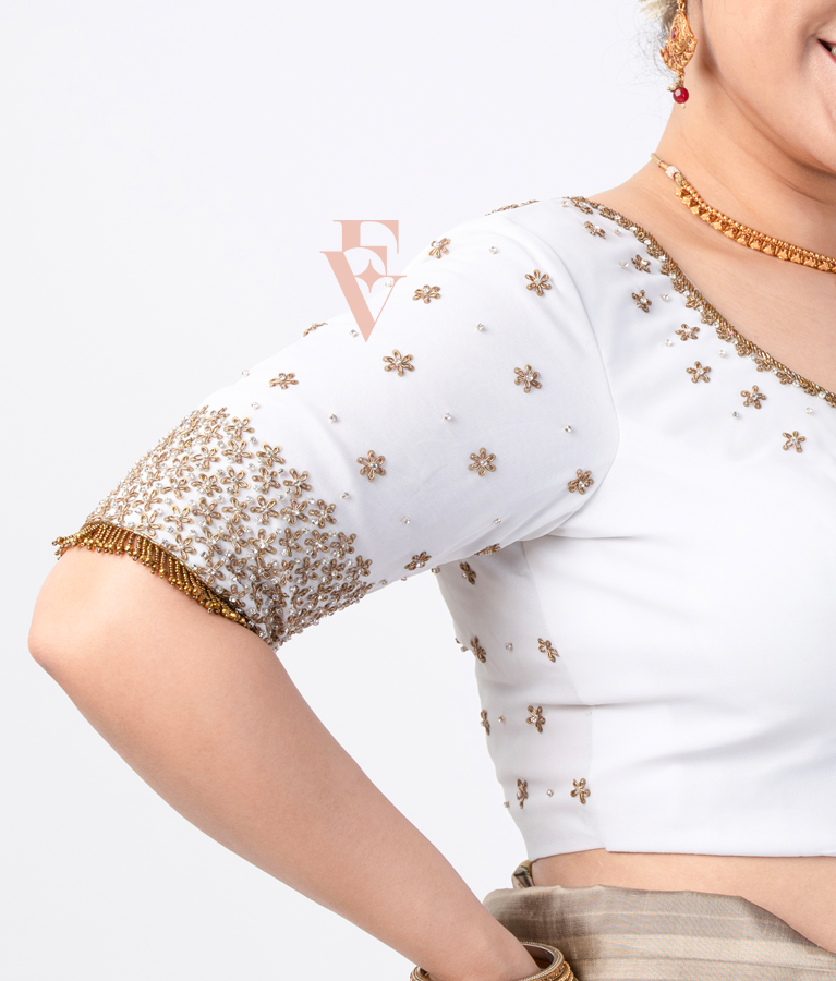 A half white georgette with net blouse