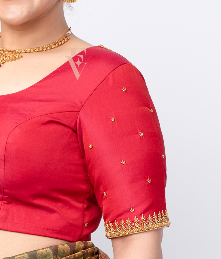 reddish pink silk cotton blouse designed in a princess-cut style