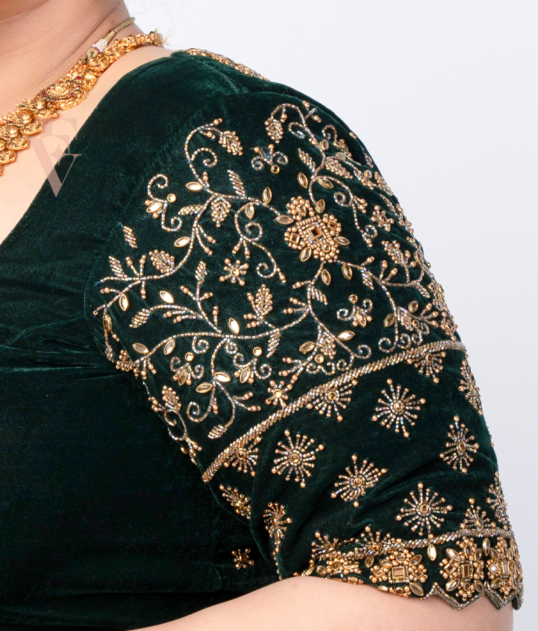A dark green premium velvet blouse