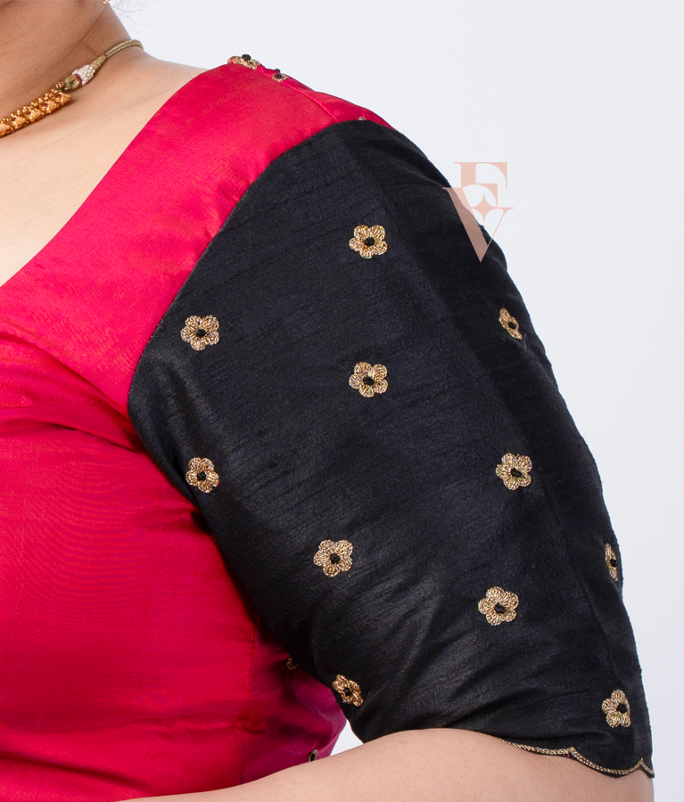 A pink and black raw silk blouse designed in a princess-cut style EB0002