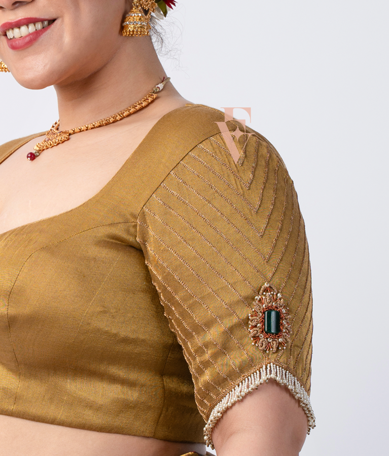 A gold tissue silk blouse