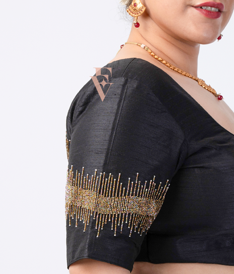 black raw silk blouse designed in a princess-cut style