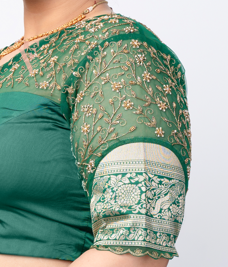 A green silk cotton with net blouse