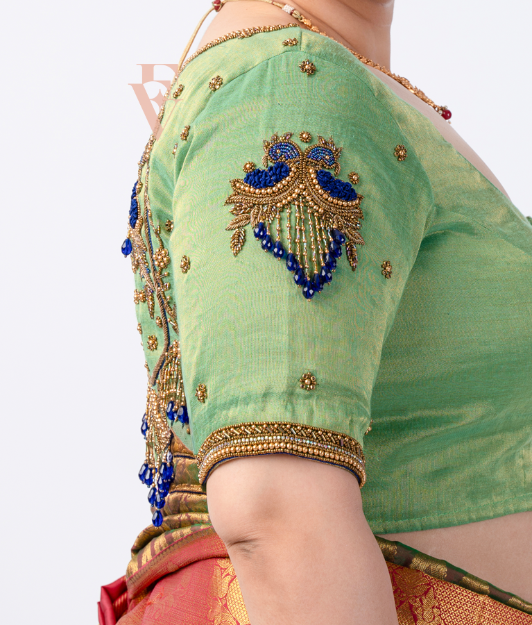A parrot green tissue silk blouse