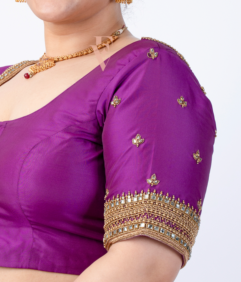 A purple silk cotton blouse designed