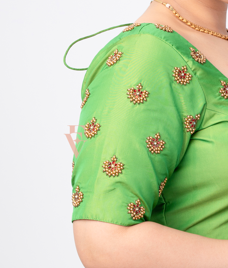 green silk cotton blouse designed in a princess-cut style