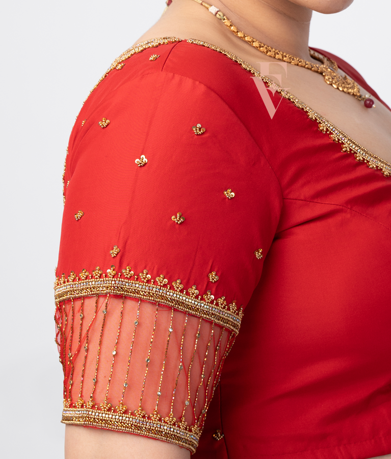 A red silk cotton net blouse designed