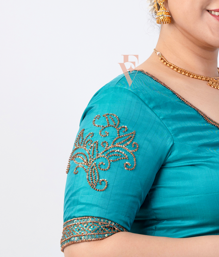 A blue silk cotton net blouse