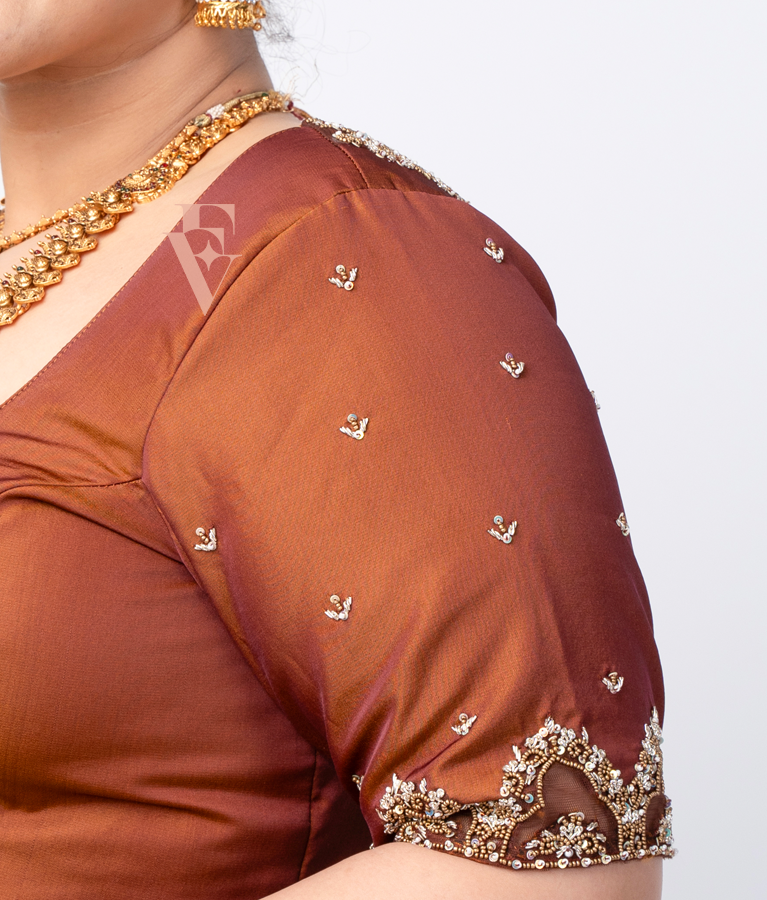 A brown silk cotton with net blouse